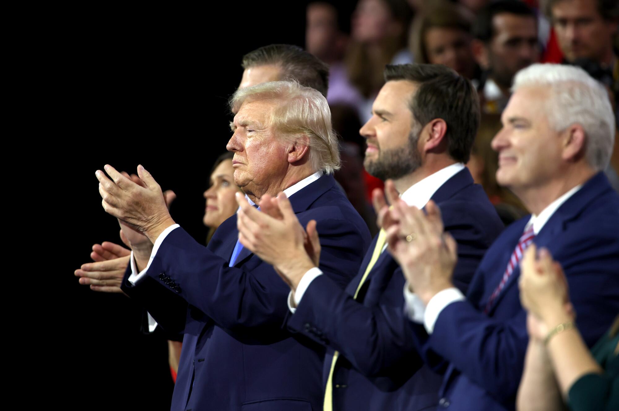 Republican presidential candidate former President Donald Trump, left, running mate Sen. J.D. Vance, second right, at RNC.