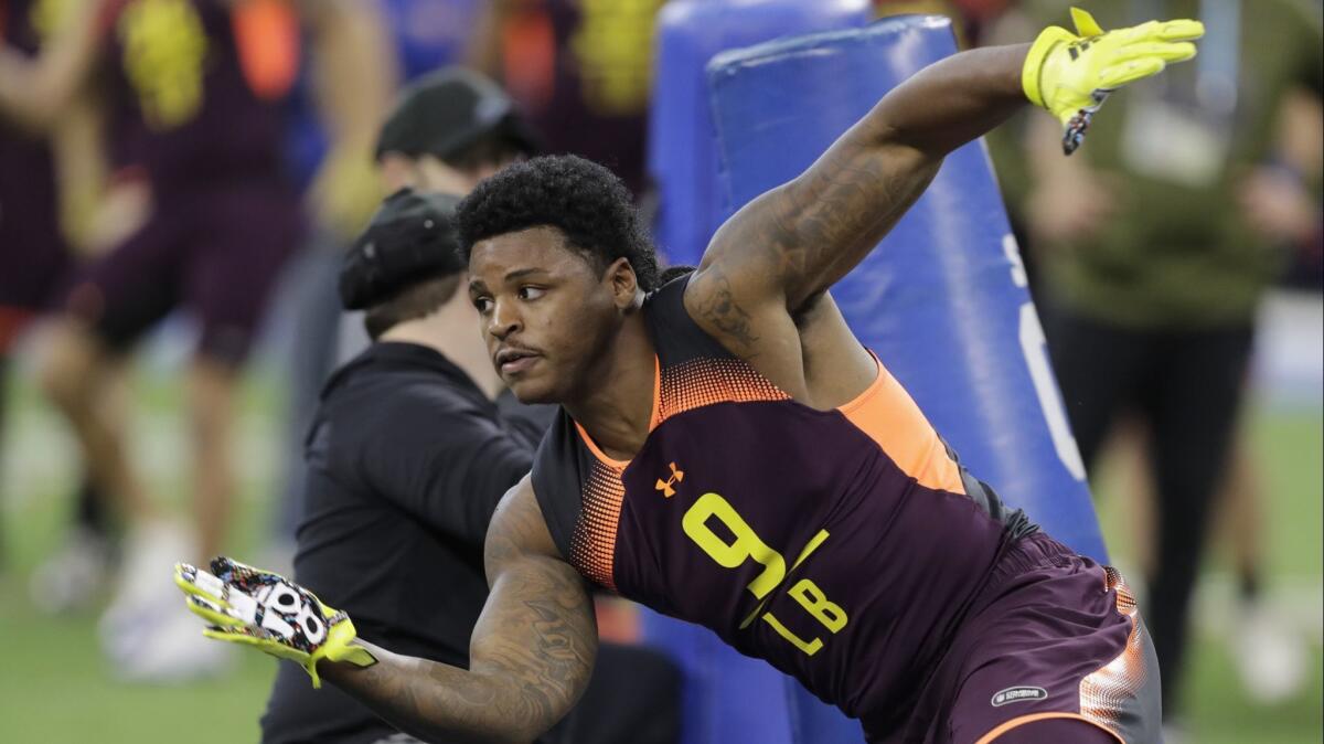 Michigan linebacker Devin Bush runs a drill at the NFL scouting combine.