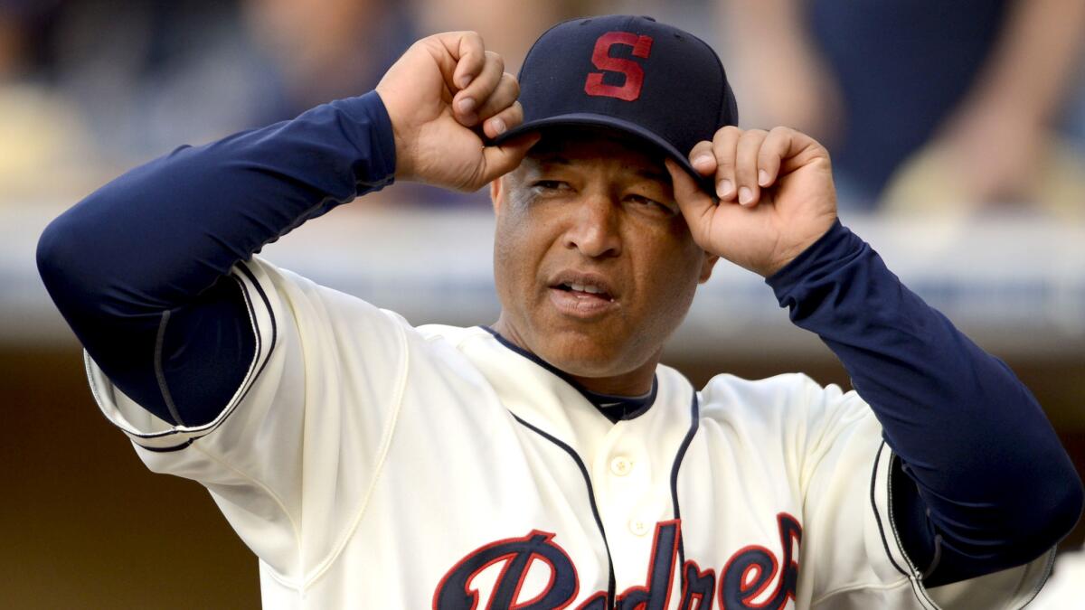 Dave Roberts played in the majors for 10 seasons before becoming a broadcast analyst for NESN and then a coach with the Padres.