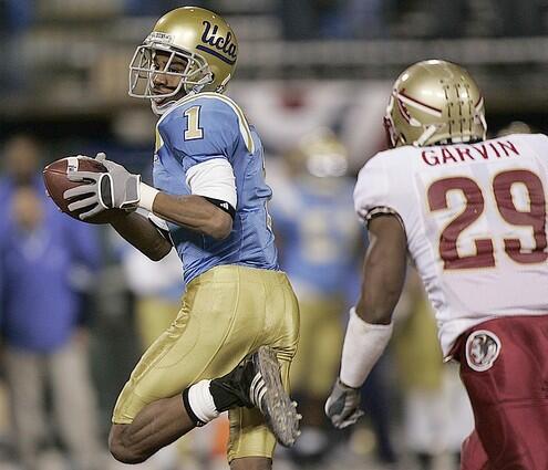 UCLA receiver Brandon Breazell sprints towards the endzone after catching a pass over Florida State defender Michael Ray Garvin.
