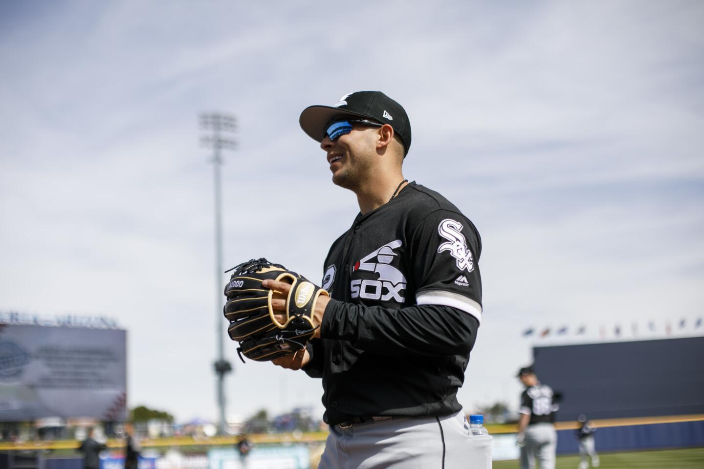 White Sox second baseman Nick Madrigal talks with fans before the first inning of a Cactus League game against the Padres at the Peoria Sports Complex on Feb. 24, 2019.