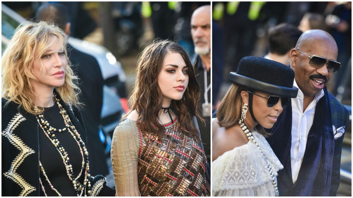 From left, Courtney Love, Frances Bean Cobain, Marjorie Bridges-Woods and Steve Harvey arrive at the Chanel runway show Oct. 4 during Paris Fashion Week.