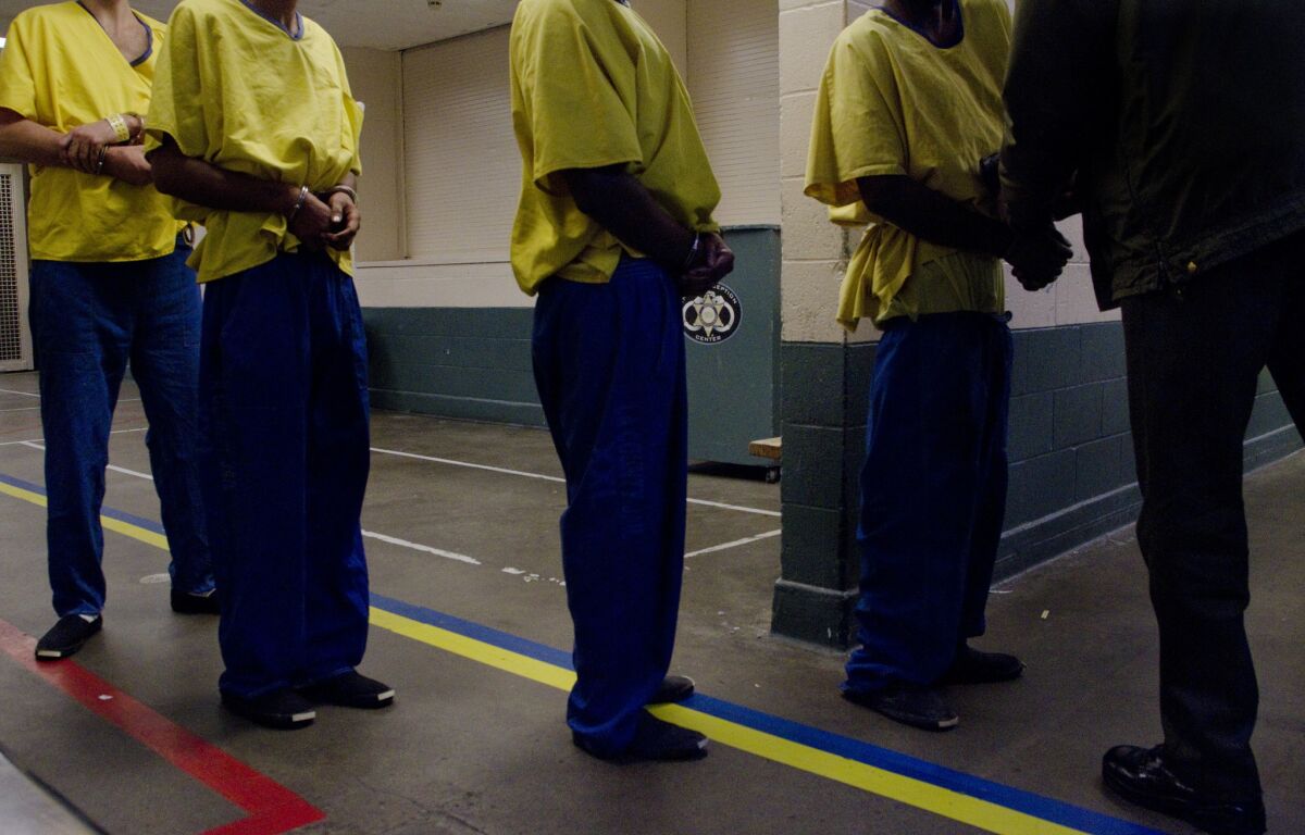 Los Angeles County Sheriff Lee Baca has proposed moving 3,000 inmates out of crowded jails, requiring them to use GPS trackers and sending them into the community. However, an audit has found issues with the reliability of the devices.