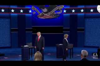 No handshake: Donald Trump and Hillary Clinton greet each other at start of debate