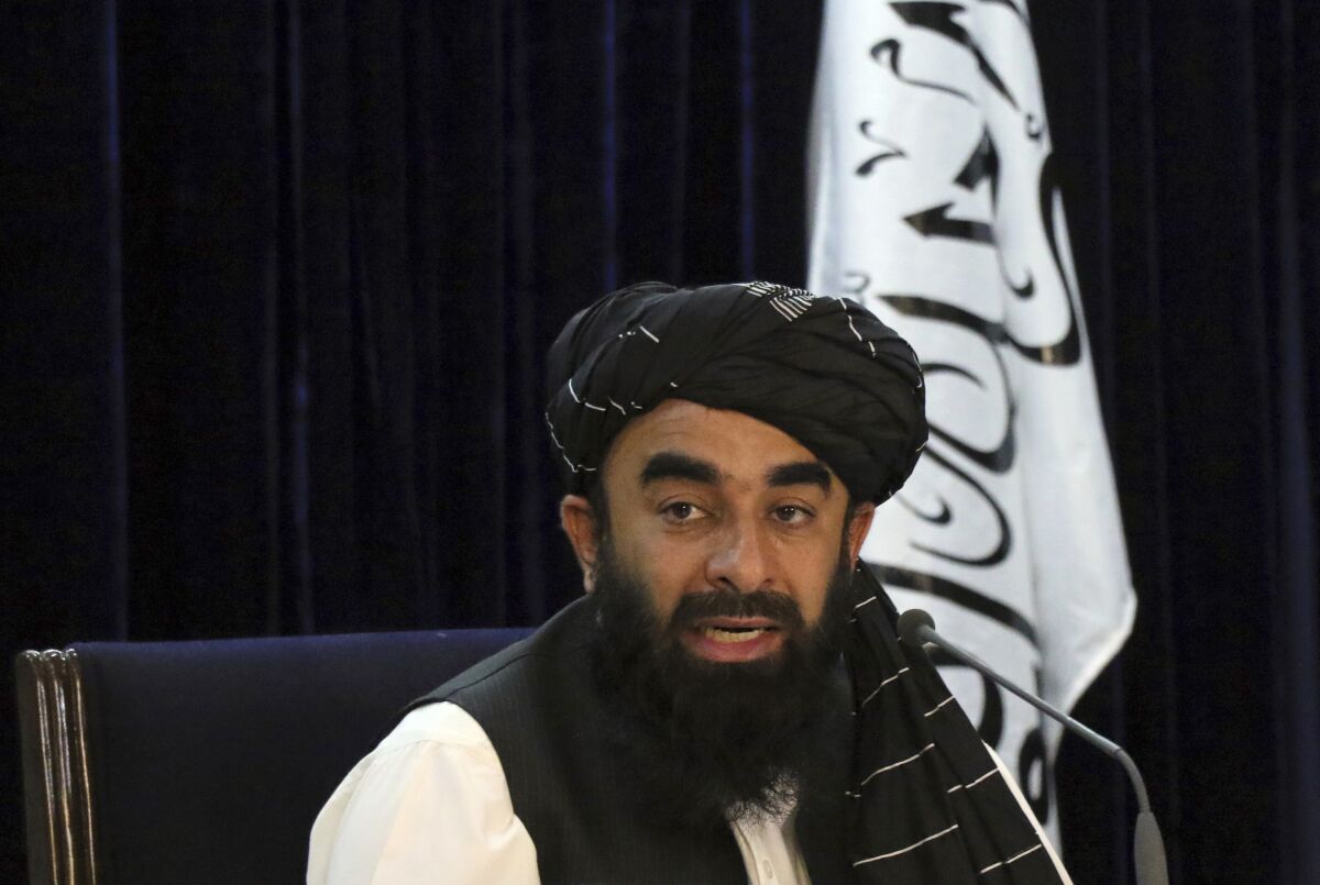 FILE - Taliban spokesman Zabihullah Mujahid speaks during a press conference in Kabul, Afghanistan on Sept. 7, 2021. Islamabad warns Afghan Taliban rulers their territory is being used by homegrown Pakistani Taliban who have stepped up attacks against the country's military. The warning followed Afghan reports that Pakistani aircraft overnight Saturday, April 16, 2022, carried out bombing raids in Afghanistan's western Khost and Kunar provinces. The Taliban's spokesman Zabihullah Mujahid said civilians were killed in the bombing raids although no official numbers have been released. (AP Photo/Muhammad Farooq, File)