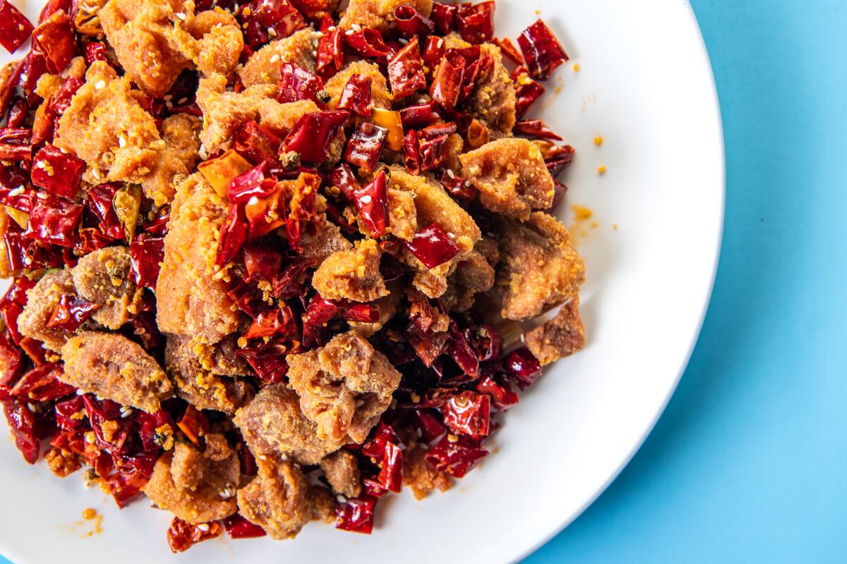 Chongqing-style fried chicken radiates spice.