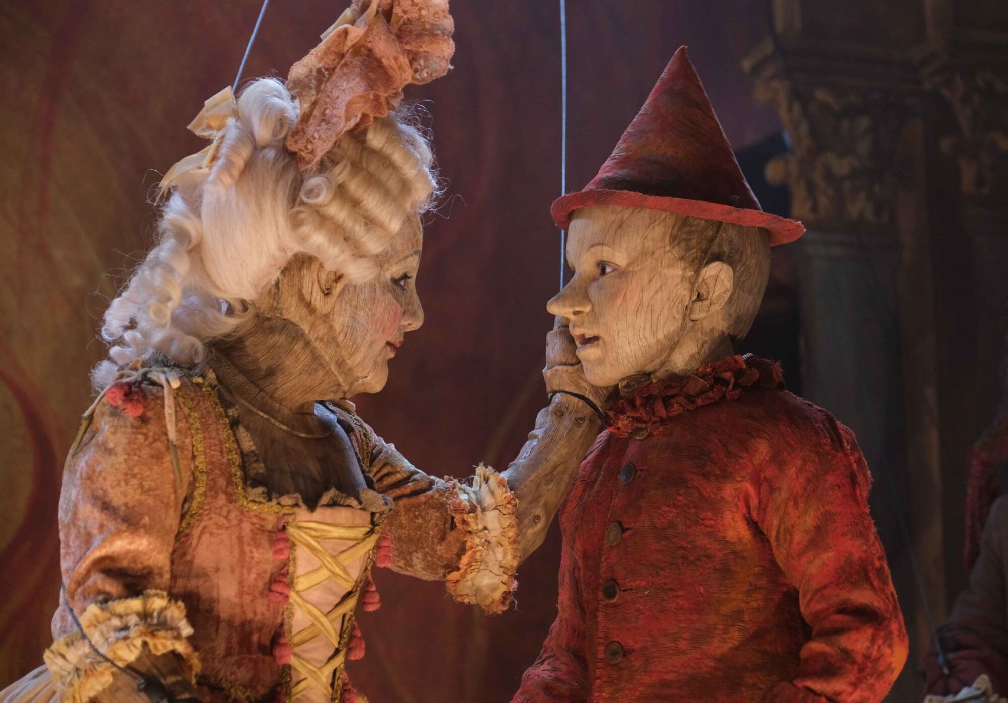 Luisa Ragusa as a puppet, and Federico Ielapi as Pinocchio 