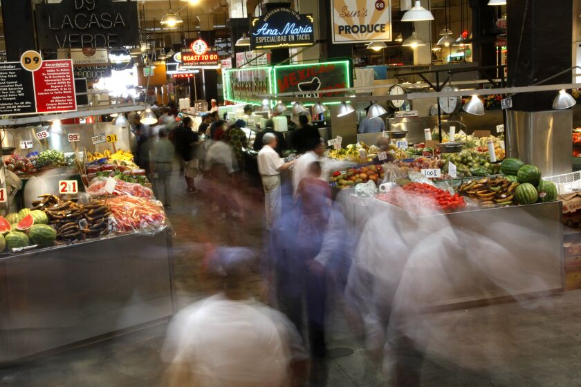 LOS ANGELES, CALIFORNIA, AUGUST 7, 2014:Activity and foot traffic peaks during lunchtime at Grand Central Market in Los Angeles where the food and a mix of new vendors with more upscale offerings is bound to make it even more crowded August 7, 2014(Mark Boster / Los Angeles Times ).
