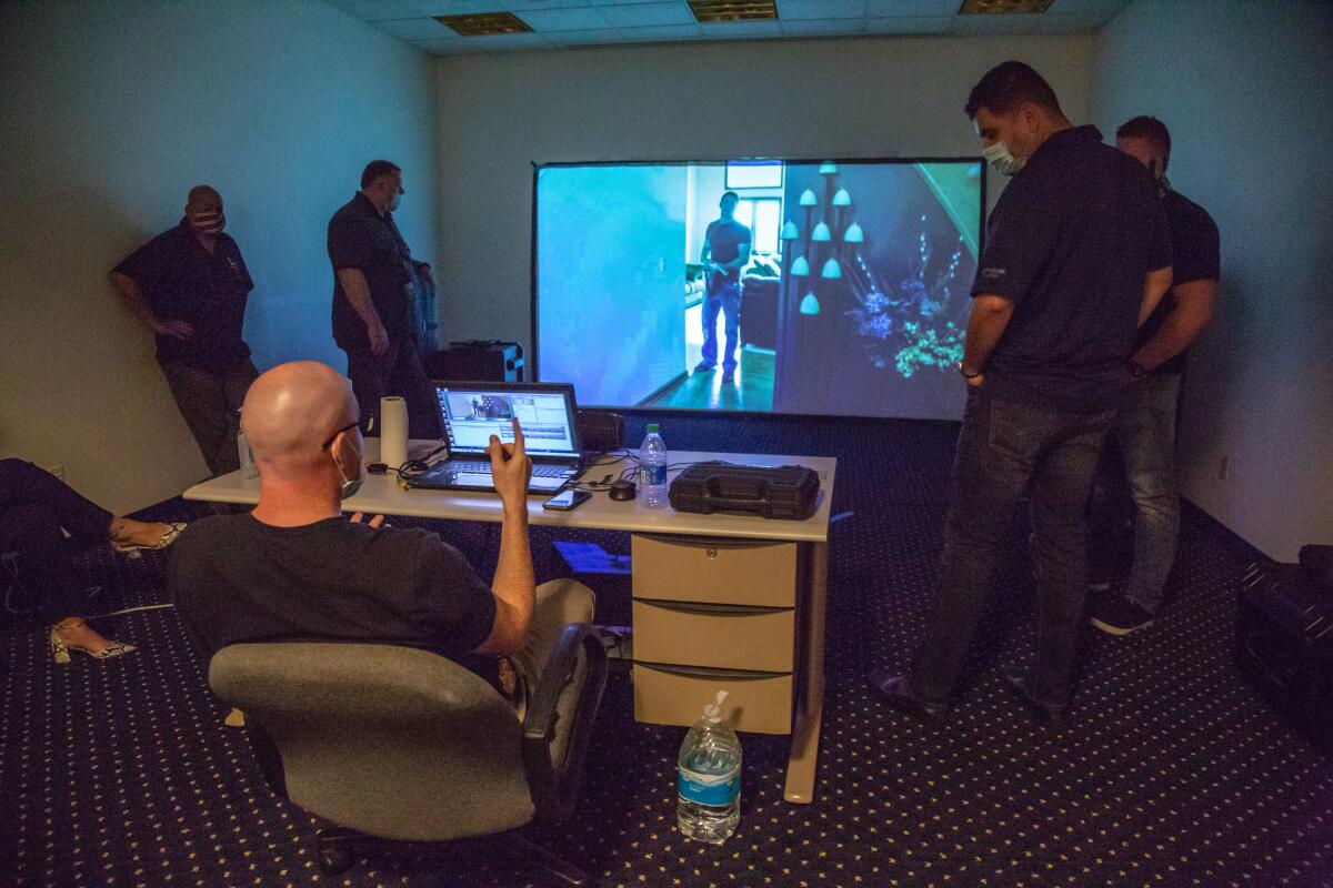 San Diego Police officers take part in a de-escalation training course 