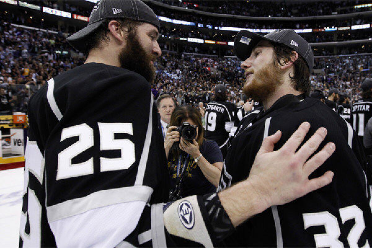The Kings -- including Dustin Penner , left, and Jonathan Quick, shown after the Kings clinched the Stanley Cup last June -- will have to start working on their playoff beards again.
