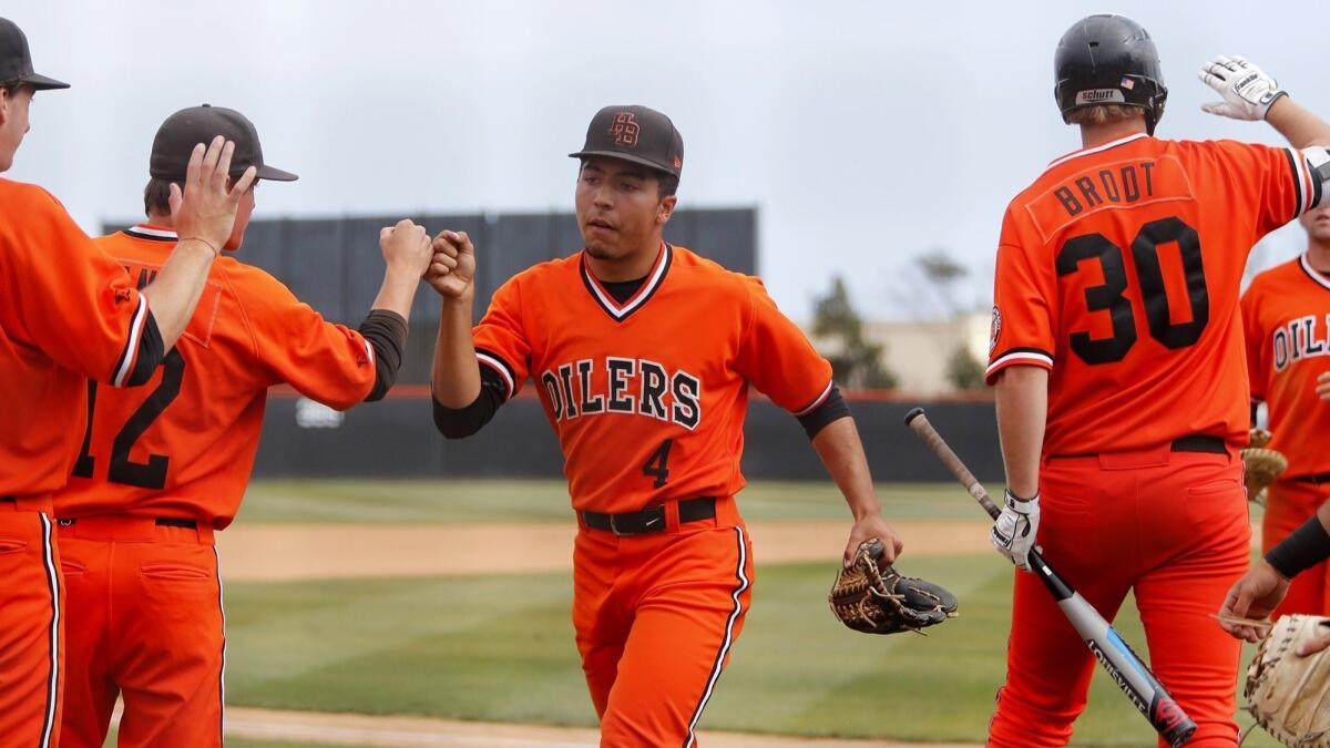 Huntington Beach High left-hander Eddie Pelc (4) threw five shutout innings on Wednesday, extending his scoreless-innings streak to 14.