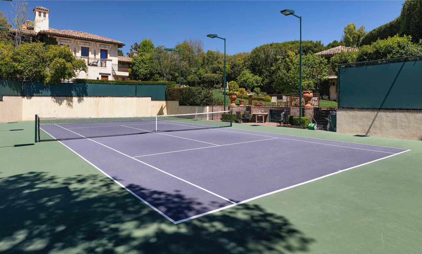 The tennis court.
