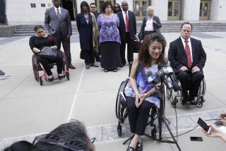 LOS ANGELES CA. JUNE 7, 2017: Whistleblower Mei Ling speaks, with her attorney Scott Moore behind her, during a media availability on June 7, 2017, outside the U.S. Courthouse in Los Angeles. The U.S. Intervened in the ?€?Whistleblower?€? Lawsuit against City of Los Angeles that Alleges City Received Millions of Dollars in Federal Grants and knowingly failed to Provide Housing Accessible to the Disabled. (Glenn Koenig/ Los Angeles Times)