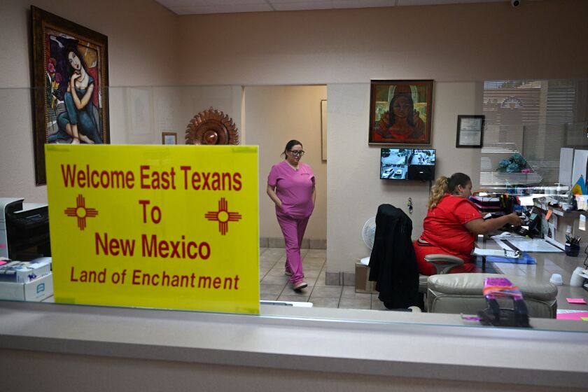 A sign welcoming patients from East Texas is displayed in the waiting area of the Women's Reproductive Clinic in New Mexico