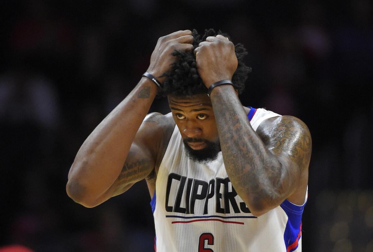 Clippers center DeAndre Jordan pulls his hair during the second half of a game against the Pelicans on Jan. 10.