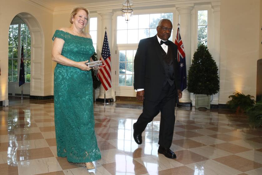 FILE - Virginia “Ginni” Thomas, wife of Supreme Court Associate Justice Clarence Thomas, right, arrive for a State Dinner with Australian Prime Minister Scott Morrison and President Donald Trump at the White House, Sept. 20, 2019, in Washington. (AP Photo/Patrick Semansky, File)