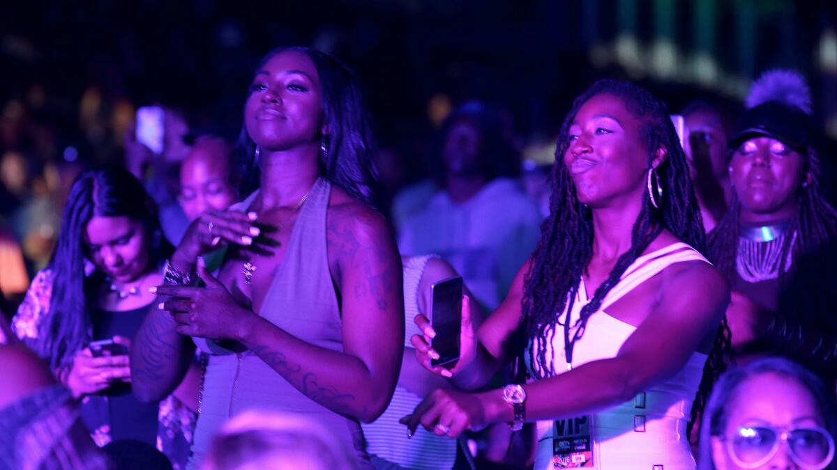 Attendees dance during the BET Experience at Staples Center in Los Angeles on June 25.