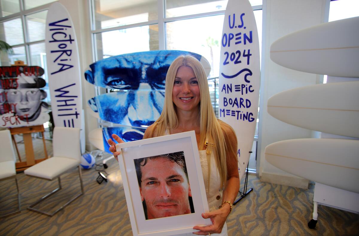 Victoria White will be live-painting a new, iconic, triple-surfboard portrait of late surf pro Andy Irons.