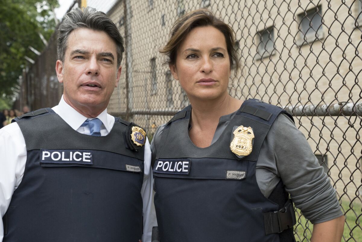 Peter Gallagher as Deputy Chief William Dodds and Mariska Hargitay as Det. Olivia Benson in a scene from "Law & Order: SVU."
