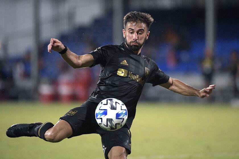 Los Angeles FC forward Diego Rossi (9) attempts a shot during the second half of an MLS soccer match.
