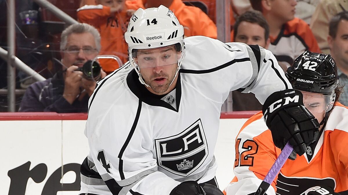 Kings right wing Justin Williams skates with the puck during a loss to Philadelphia Flyers on Oct. 28.