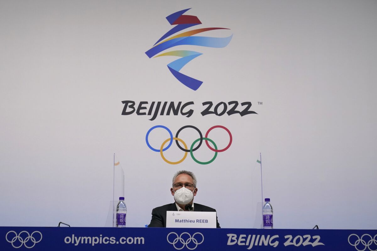 Court of Arbitration for Sport director general Matthieu Reeb addresses a press conference at the 2022 Winter Olympics, Monday, Feb. 14, 2022, in Beijing. The Court ruled after a hastily arranged hearing that lasted into early Monday morning that the 15-year-old Kamila Valieva, the favorite for the women's individual gold, does not need to be provisionally suspended ahead of a full investigation. (AP Photo/Sue Ogrocki)