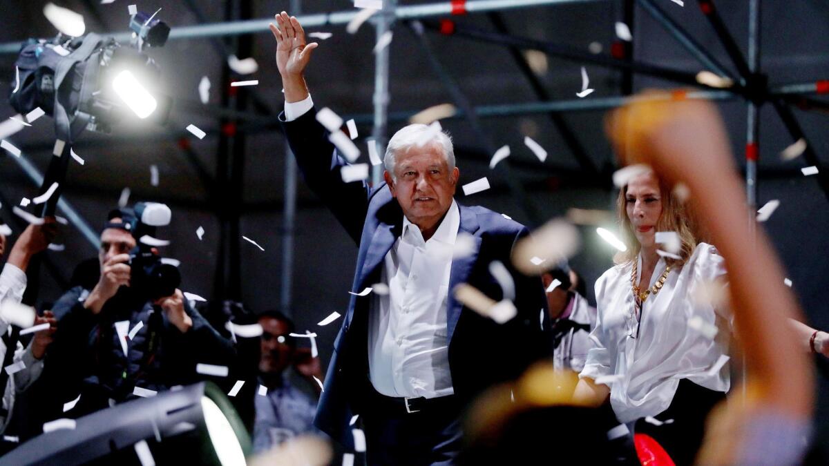 Mexican President-elect Andres Manuel Lopez Obrador celebrates in Mexico City's Zocalo on July 1. He won the election by a landslide.