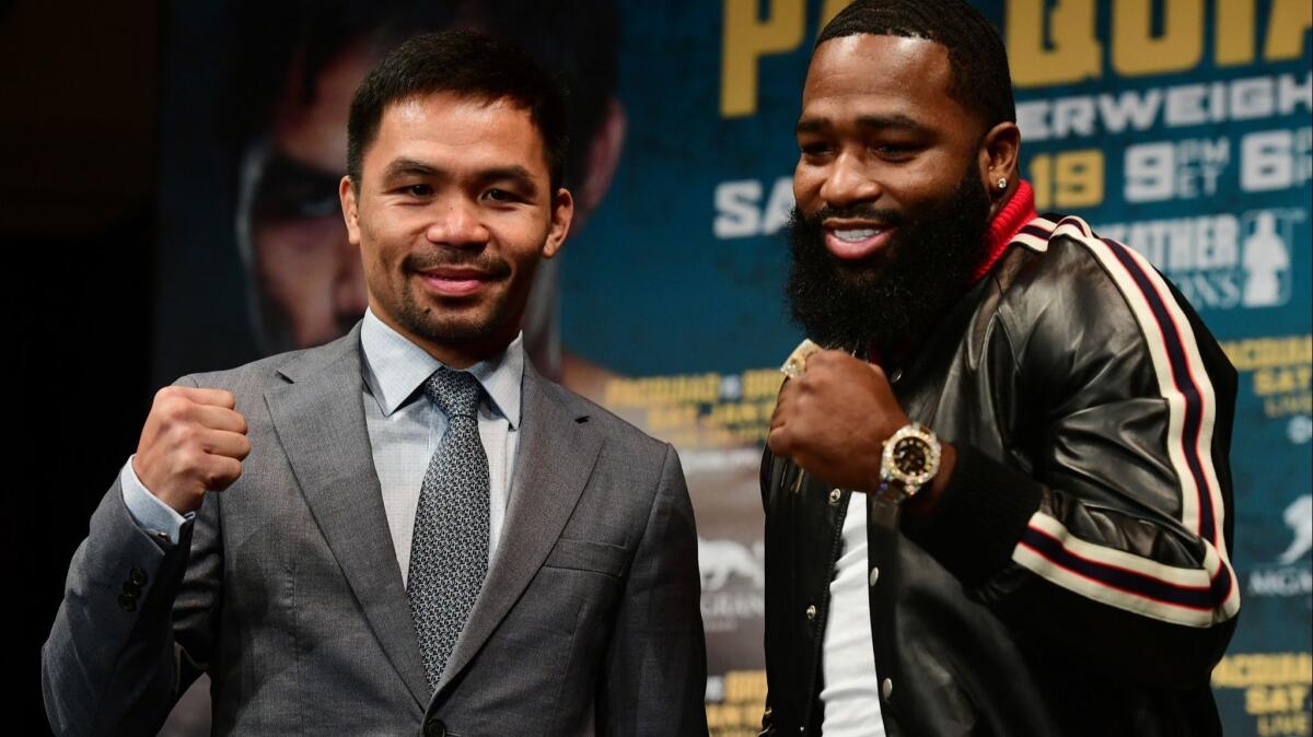 Manny Pacquiao, left, and Adrien Broner promote their upcoming bout on Tuesday in New York City. The fight is set to take place on Jan. 19, 2019 in Las Vegas.