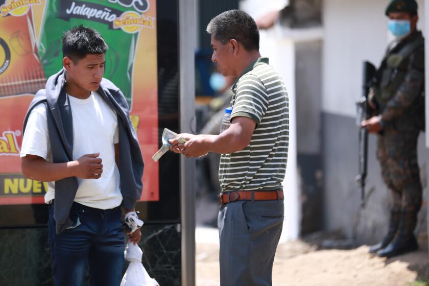 Father and his son, after his arrival as returnee form United States during outbreak of Coronavirus in Guatemala.