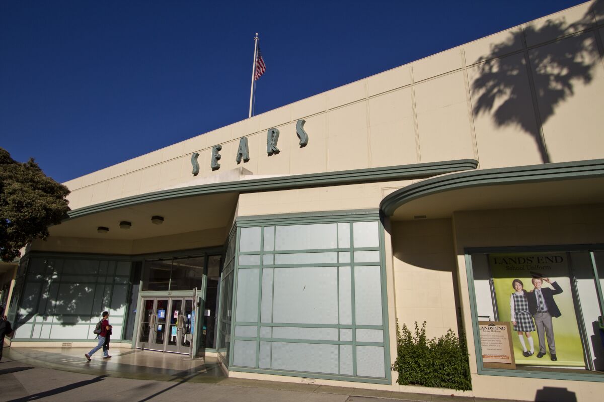 The Sears logo above the entrance to a Streamline Moderne style building