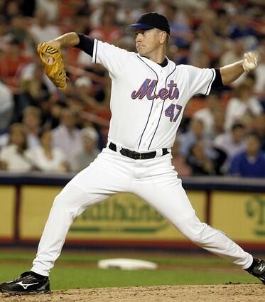 New York Mets pitcher Tom Glavine delivers a pitch in the fourth inning.