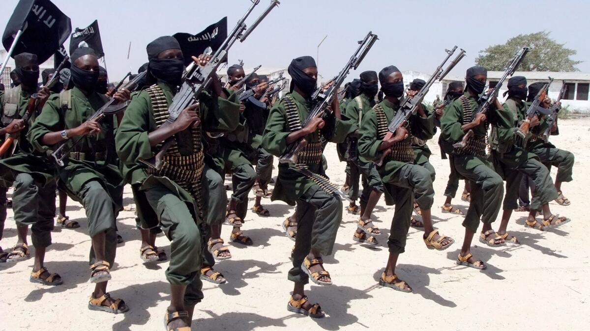 Hundreds of newly trained Shabab fighters perform military exercises south of Mogadishu in February 2011.