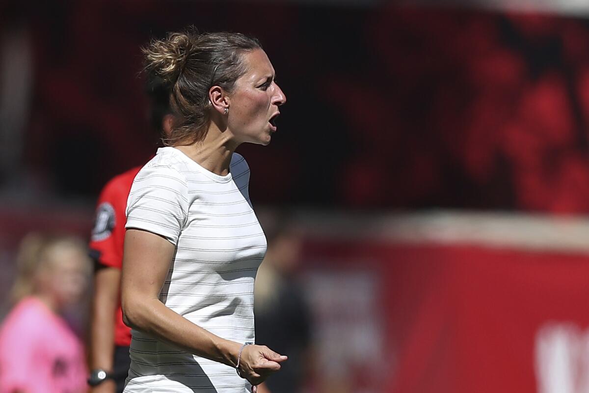 Sky Blue FC interim head coach Freya Coombe yells instructions to her team.