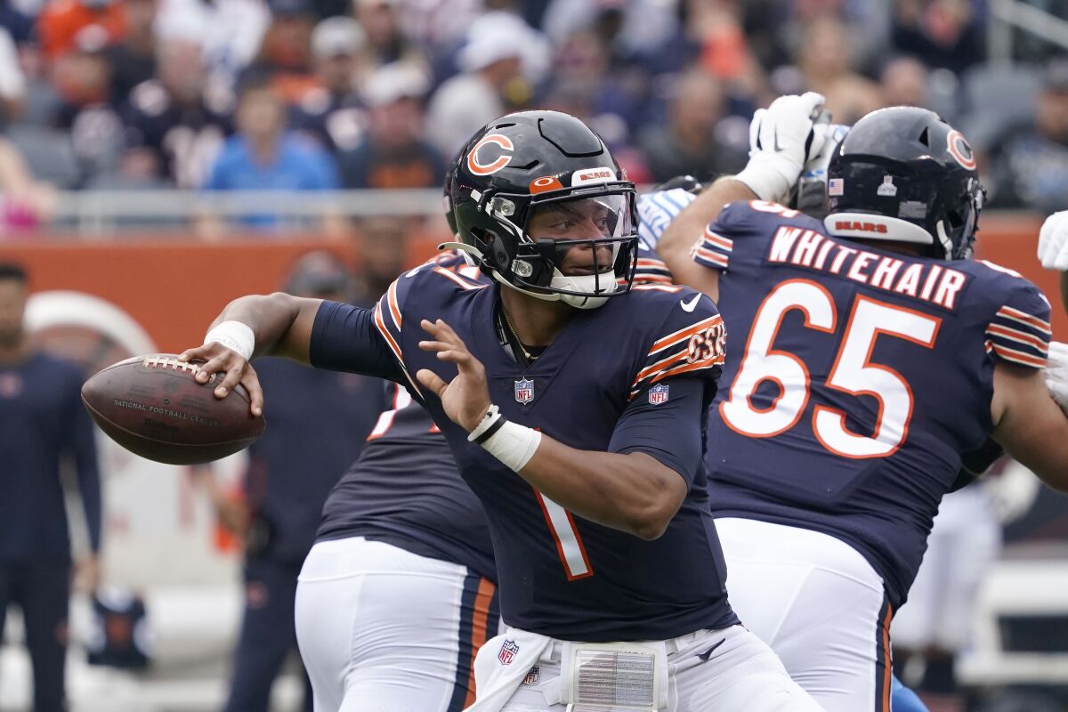 Chicago Bears quarterback Justin Fields passes during the first half of an NFL football game against the Detroit Lions Sunday, Oct. 3, 2021, in Chicago. (AP Photo/David Banks)