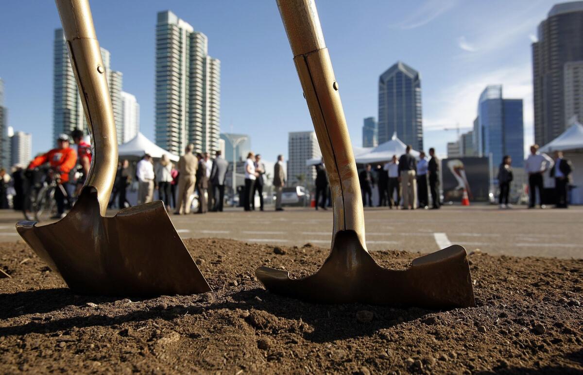 Shovels stand in ground before groundbreaking of the North Embarcadero Visionary Plan's first phase.