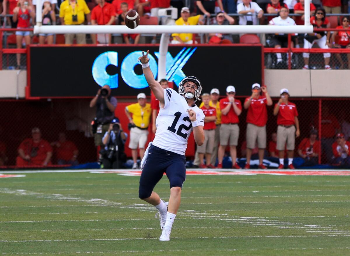 BYU quarterback Tanner Mangum throws for the game-winning touchdown with no time left Saturday against Nebraska.