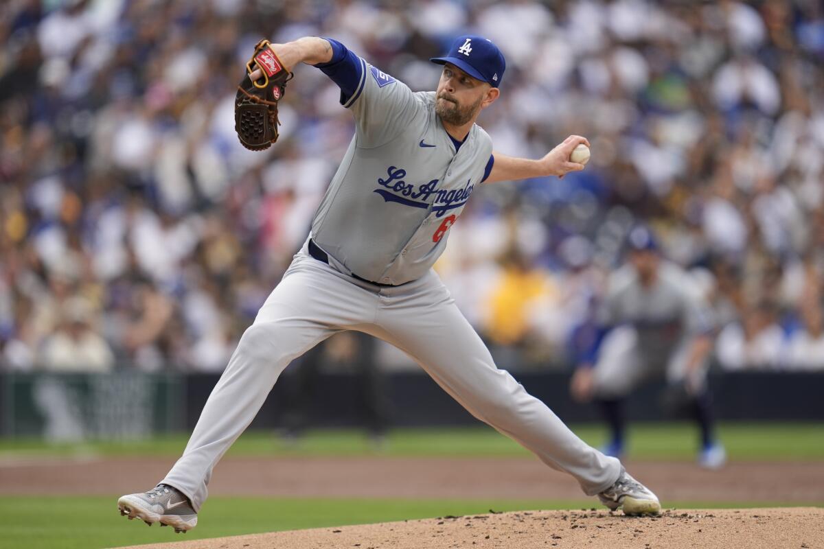Dodgers starting pitcher James Paxton works against a San Diego Padres batter during the first inning Saturday 