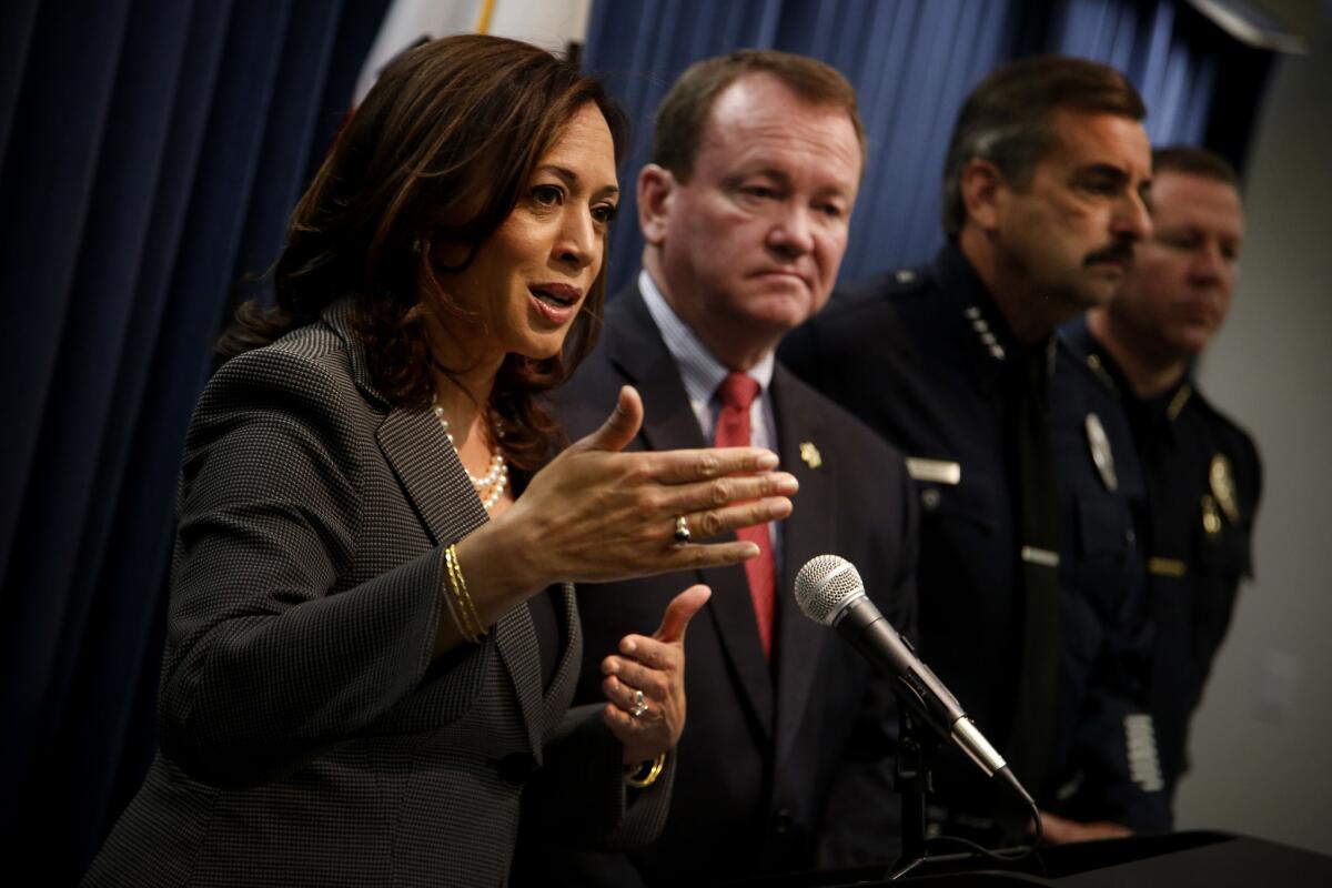 California Atty. Gen. Kamala Harris discussed steps to prevent police bias at a news conference Friday in her downtown Los Angeles office with Los Angeles County Sheriff Jim McDonnell and LAPD Chief Charlie Beck.