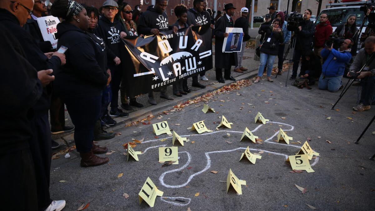 Protesters rally outside police headquarters in Chicago on Oct. 20, the two-year anniversary of the shooting death of Laquan McDonald.