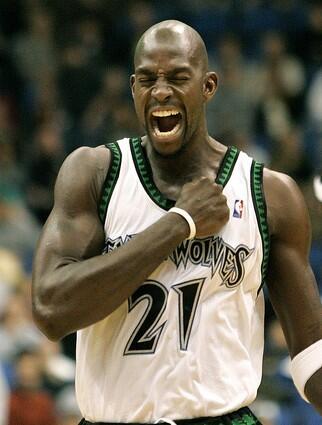 Minnesota Timberwolves forward Kevin Garnett pumps his fist to his chest before the start of the basketball game with the Los Angeles Clippers in Minneapolis Saturday.