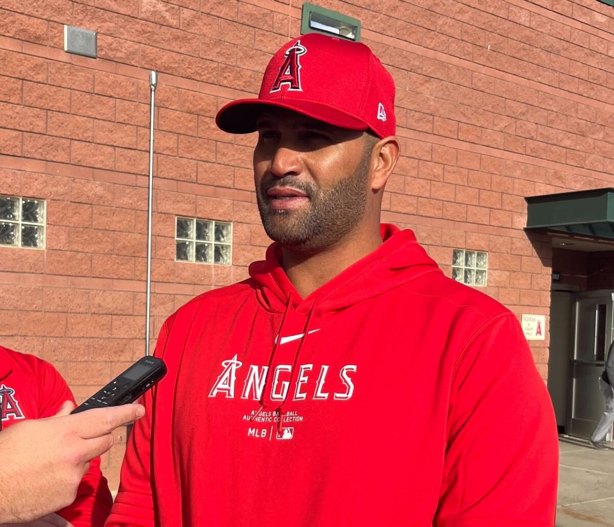 Albert Pujols speaks with reporters at Angels camp on Monday, March 4 in Tempe, Ariz.