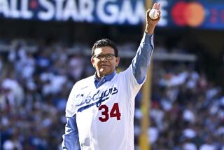 LOS ANGELES, CA - JULY 19: Fernando Valenzuela prepares to throw out the first pitch.