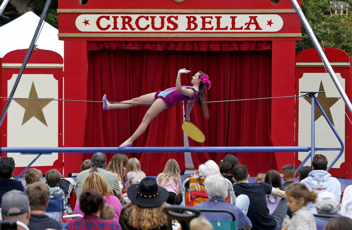 Tightwire act Logan Kerr balances in front of the audience during the Circus Bella "Bananas" show in Laguna Beach.