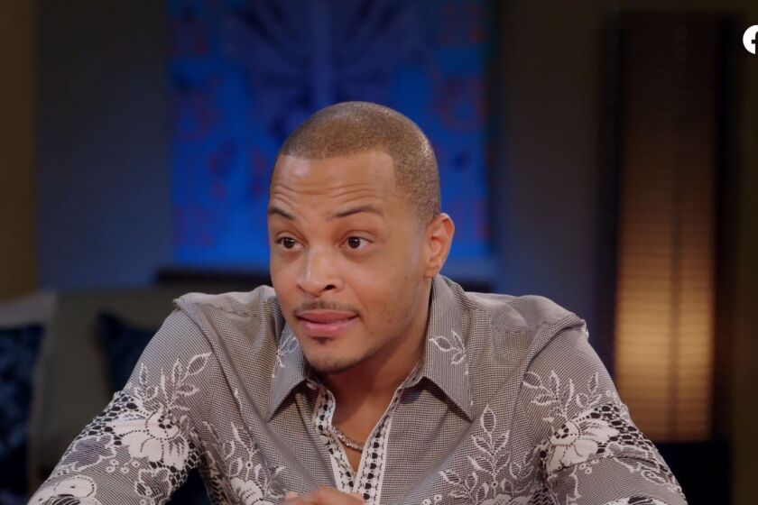 Rapper T.I. reacts to the blowback over his comments about policing his daughter's hymen in a screen grab from Jada Pinkett's Red Table Talk.