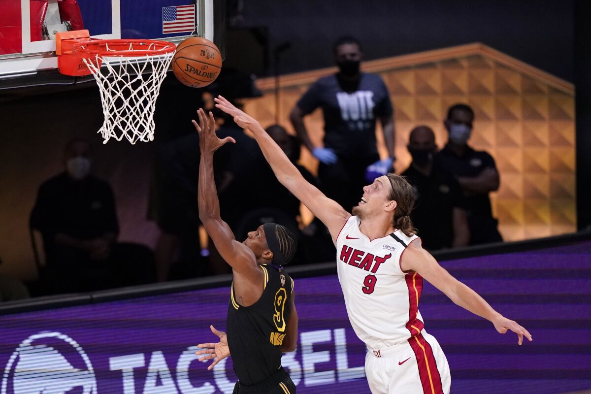 Lakers guard Rajon Rondo gets down the lane for a layup before Heat center Kelly Olynyk can block the shot during Game 2.