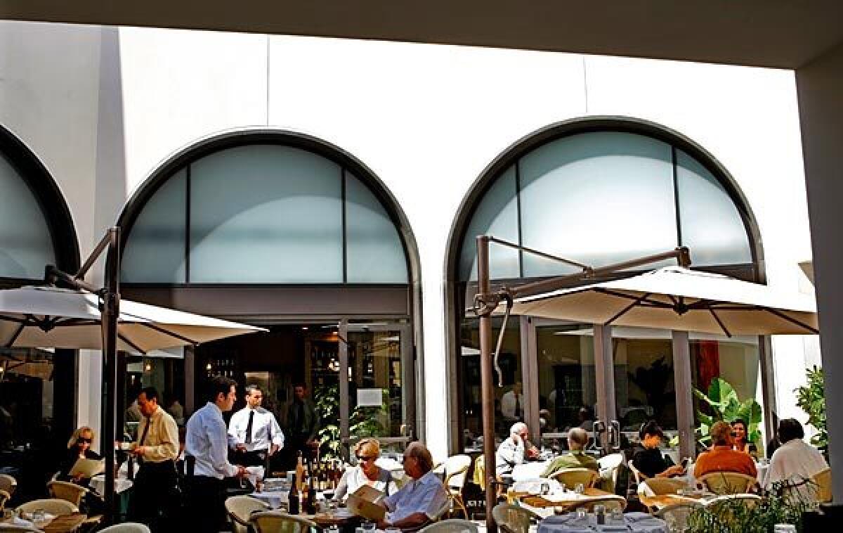 The outdoor dining area at Beverly Hills' revamped Caffe Roma seats up to 70.