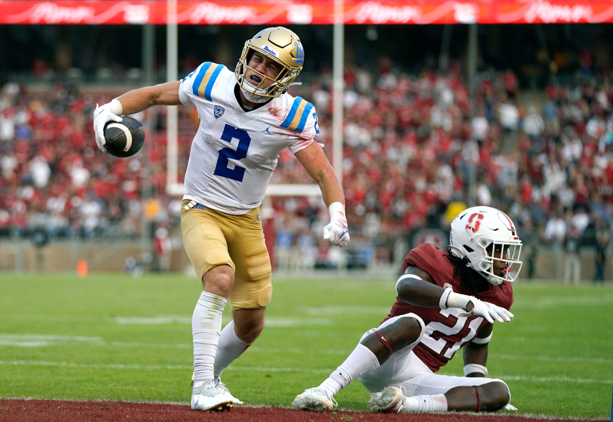 UCLA's Kyle Philips celebrates his fourth-quarter touchdown catch against Stanford on Sept. 25, 2021