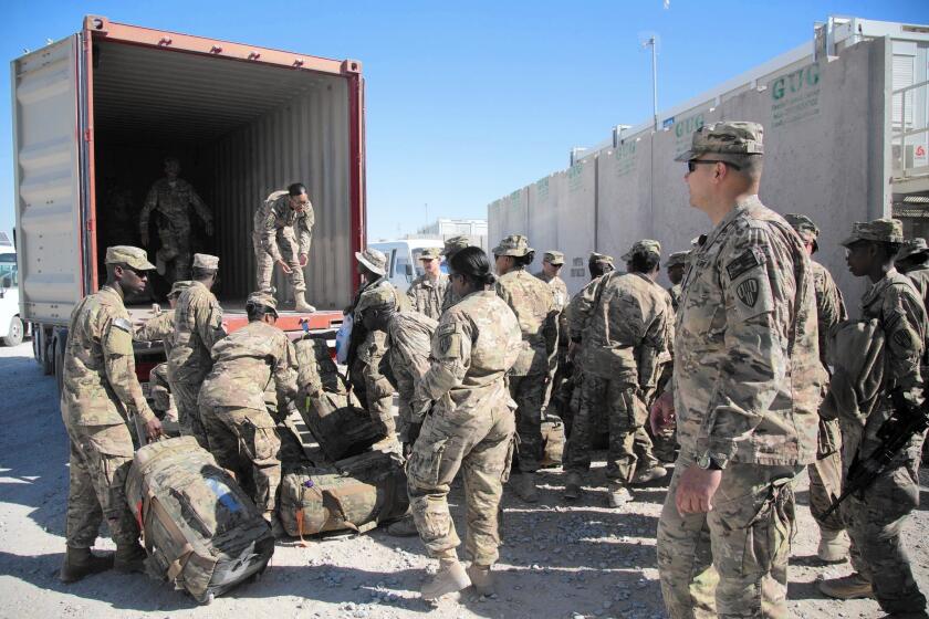 U.S. troops prepare to leave Kandahar airfield at the end of their tour in November.