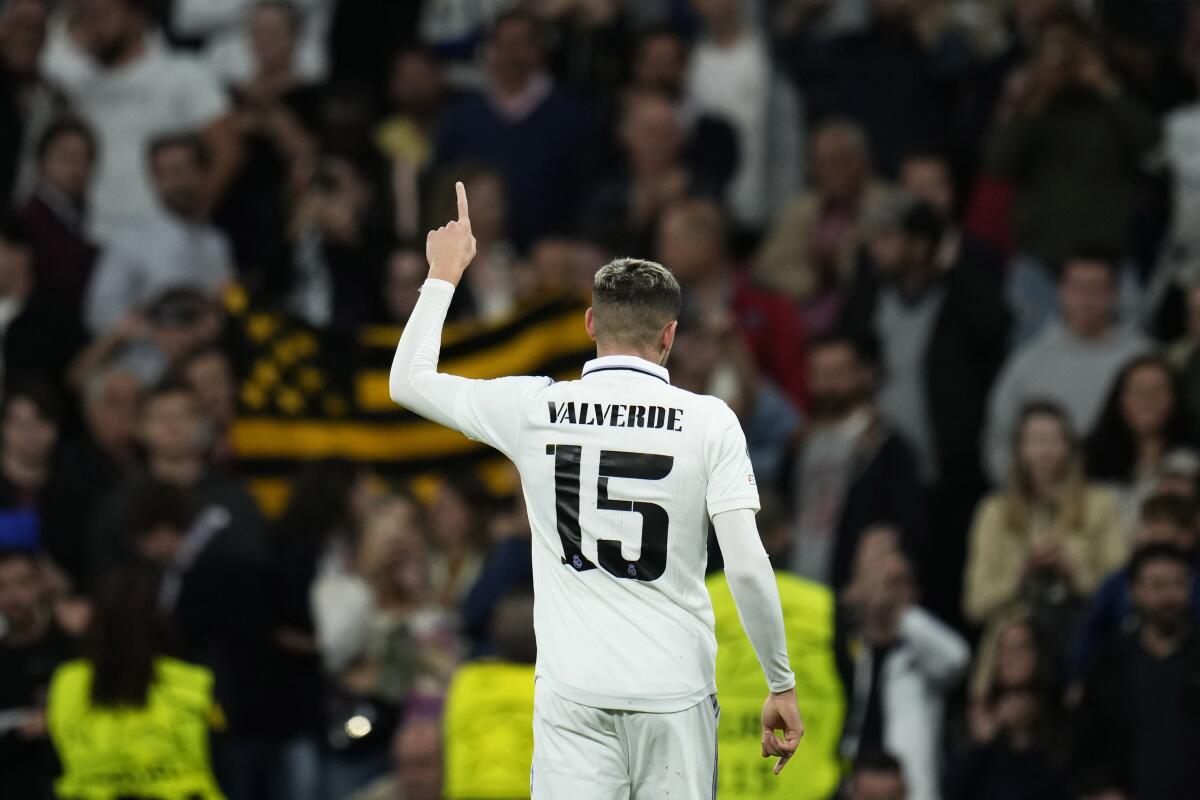 Real Madrid's Federico Valverde celebrates after scoring his side's fifth goal during the Champions League Group F soccer match between Real Madrid and Celtic at the Santiago Bernabeu stadium in Madrid, Spain, Wednesday, Nov. 2, 2022. (AP Photo/Manu Fernandez)