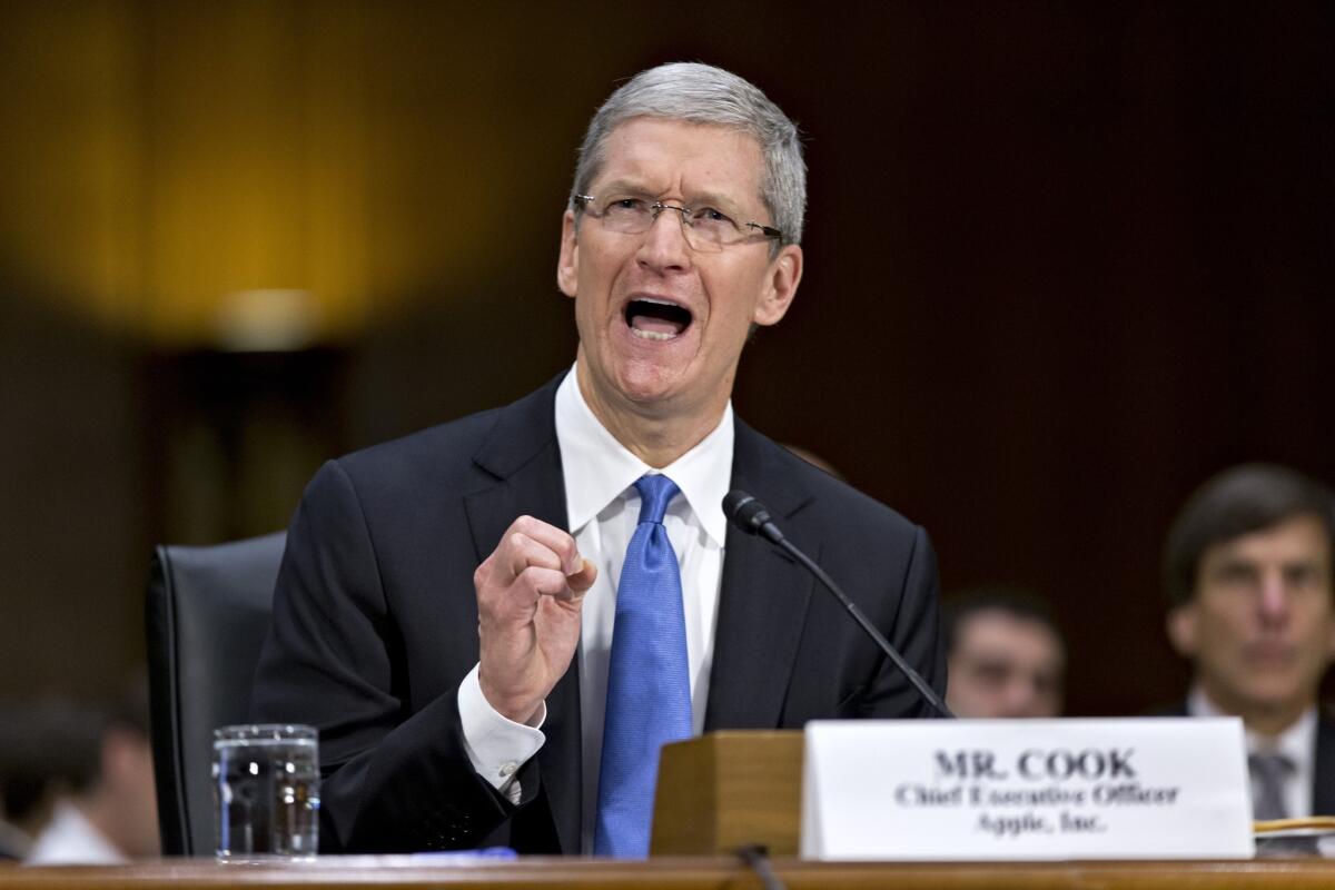 Apple Inc. CEO Tim Cook testifies before a Senate subcommittee about the company's offshore tax policies on May 21, 2013.